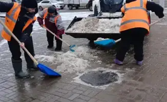 Снегоуборочные работы в Астане мокрый снег дождь коммунальщики