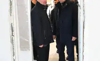 Строительство школы и многоквартирных домов в Алматы