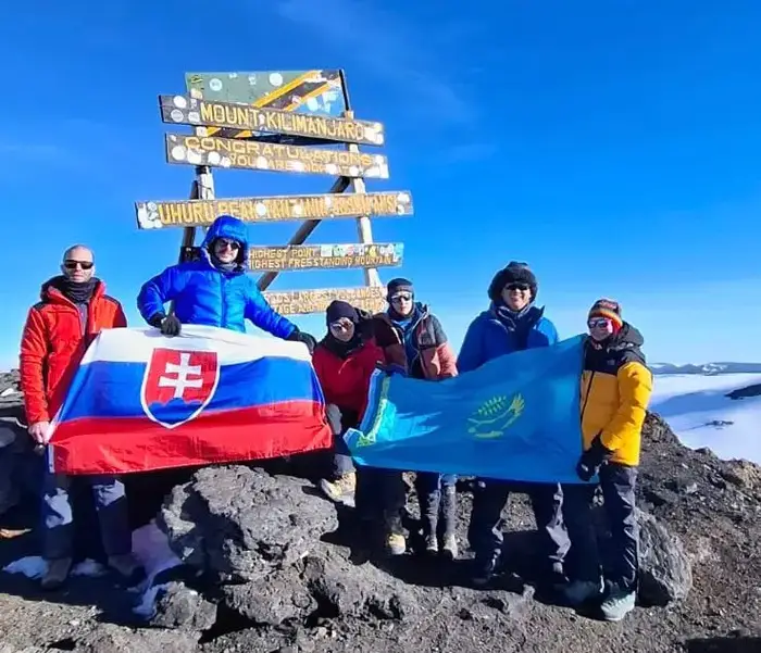 Kazakh Journalist Climbs Mount Kilimanjaro, Honoring Father and Hometown with Flag